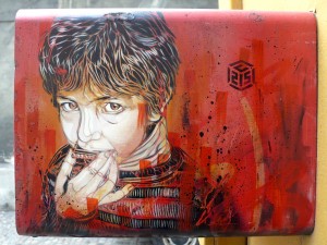 C215 Stencil artwork on red mailbox